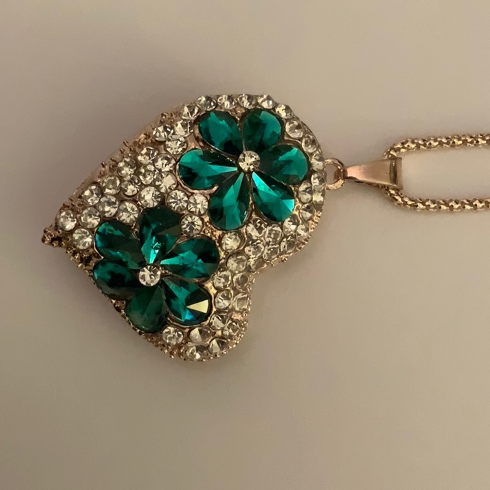 Long golden chain, large Rhinestone heart pendant.